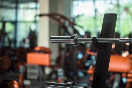 diverse equipment and machines at the gym room for sport training and weightlifting, closeup