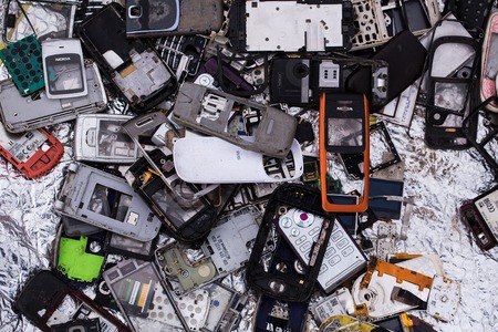 Trash - April 17, 2016: Pile of trash with many old disassembled broken covers parts of mobile...