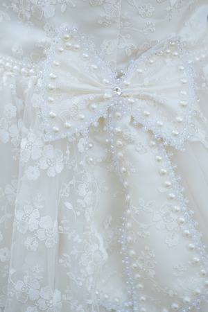 Festive wedding ceremony chair decoration of lightweight white fabric closeupの写真素材