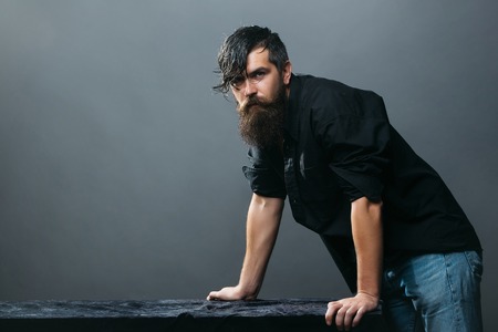 Handsome man with the beard and wet hairの写真素材