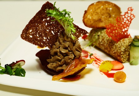 Delicious snack of whipped puree or paste on red beet and roll with sesame seeds with wheat and...