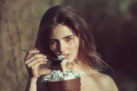 beauty and fashion, healthy eating and dieting, spring and summer, spa and relax, woman and flowersの写真素材