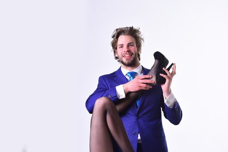 young woman with sexy legs and happy man in suit, love and family, business and fashion, wedding, isolated on white background, copy spaceの写真素材