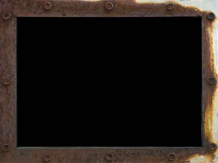 frame scrap, with metallic rusted surface texture, with iron rivets and black screen on metallized background. Neglect, decay and ruin, copy spaceの写真素材