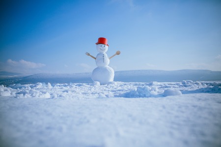 Christmas or xmas decoration. New year snowman chef from snow with pot. Winter party and cooking....