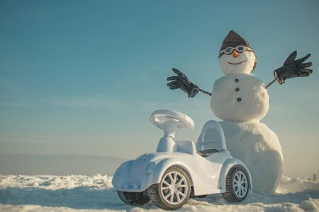 Christmas and transportation. Xmas or christmas decoration, aviation. New year snowman in pilot hat...