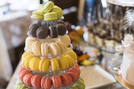 Dessert, food, snack. Macaroons on cake stand. French cuisine, menu, recipes. Macaroon cookies for birthday, anniversary, mothers day celebration.の写真素材