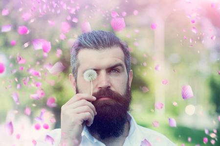 Sexy man in meadow. Man in flowersの写真素材