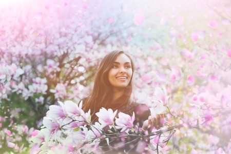 Girl with sacura tree. Cherry tree.の写真素材