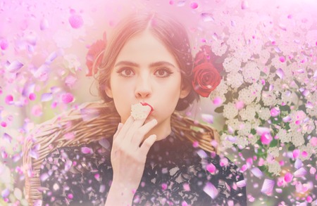 Caucasian girl in flowers. Spring flowersの写真素材