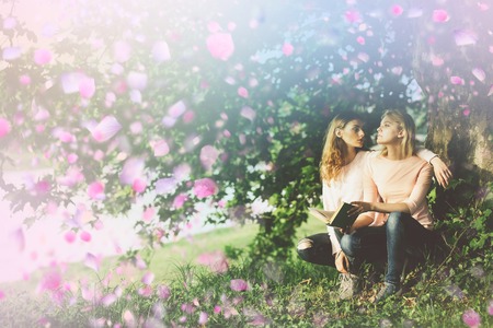 Lesbian couple. Cute lesbian couple having fun in spring day.の写真素材