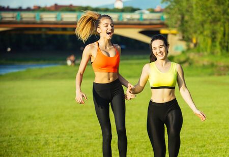 Running women jogging in country, sport, wellness.の写真素材