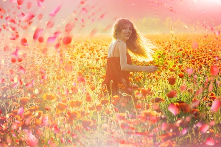 Caucasian girl in flowers. Spring flowersの写真素材