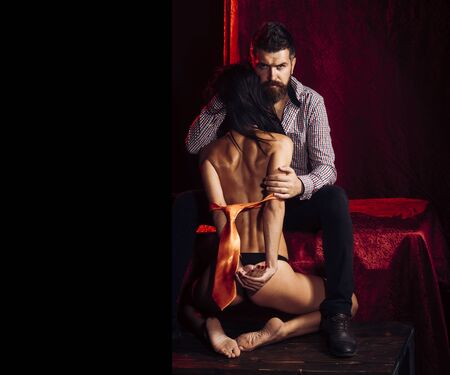 Erotic games, sex, orgasm, girl and man. erotic games of couple in love, copy spaceの写真素材