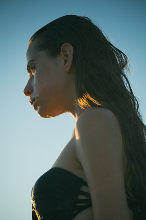 Beautiful woman with honey on face. spaの写真素材