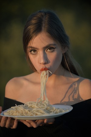 Hunger, appetite, recipe. Italian macaroni or spaghetti for dinner, cook. Diet and healthy organic...