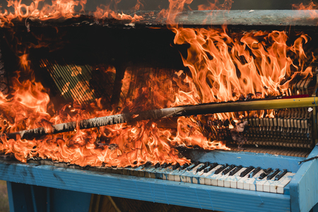Piano on fire, keyboard, smoke. piano on fire burningの写真素材