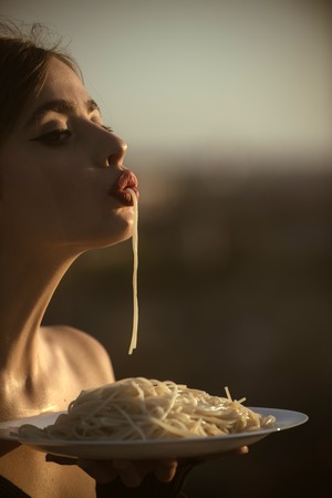 Italian macaroni or spaghetti for dinner, cook. Diet and healthy organic food, italy. Hunger,...