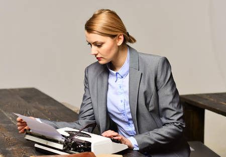 Student conference in loft interior coworking space using digital devices and wifi, Talented coach during workshop indoors - productive training in stylish college interior,の写真素材