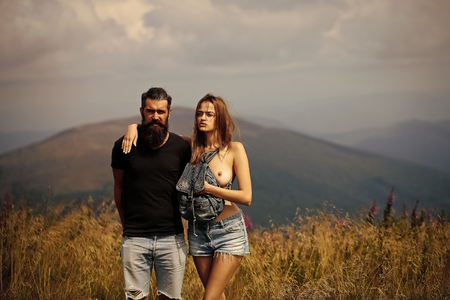 Romantic couple on mountain topの写真素材