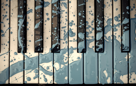 Closeup of blue painted old piano decorated. blue festive decor. Horizontal color photo.の写真素材