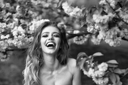 Happy woman in blossomの写真素材