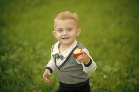Happy kid having fun. Health, healthcare, healthy dietの写真素材