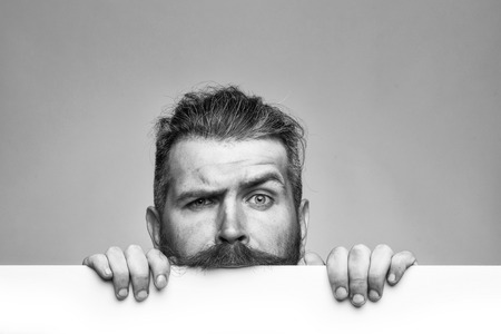 Man face handsome. serious man with paperの写真素材