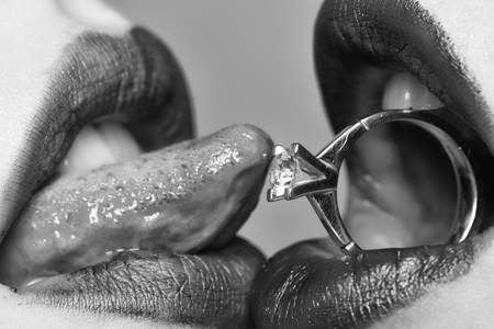 Female lips with ringの写真素材