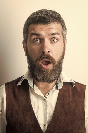 Face fashion boy or Man in your web site. Man face portrait in your advertisnent. Hipster in shirt and waistcoat.の写真素材