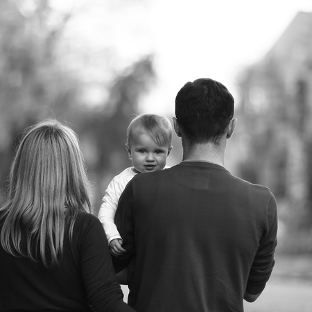 Happy kid having fun. Cute baby boy with familyの写真素材