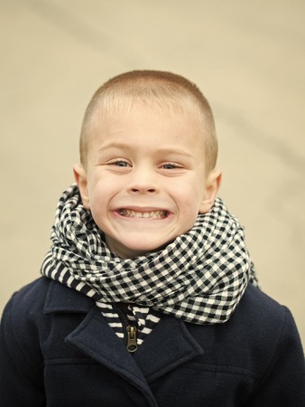 Happy kid. Child or little boy with cute face.