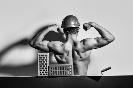 building materials. Handyman. sexy muscular man builderの写真素材