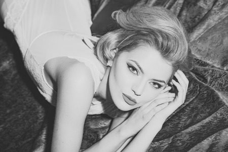 Retro hairstyle. Pretty retro womanの写真素材