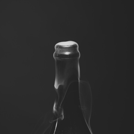 Champagne bottle with smoke
