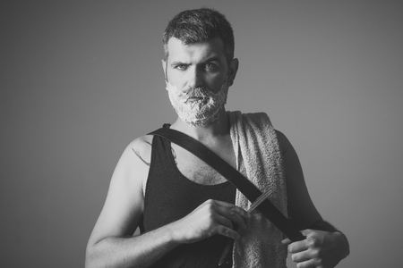 man is shaving. Fashion and beauty, innovation.の写真素材