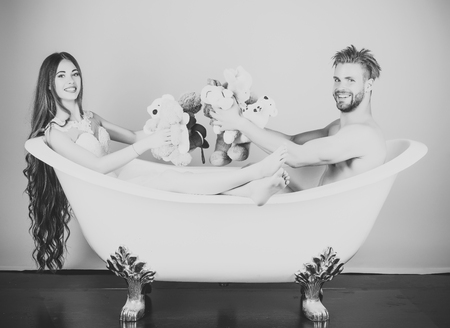 Couple in love of man and woman in bath.の写真素材