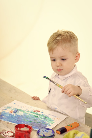 drawing lessons. Happy easter family paint eggs.の写真素材