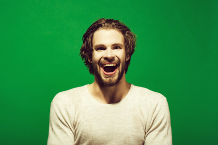 treatment of depressions. happy man with wet head, face and hair in morningの写真素材