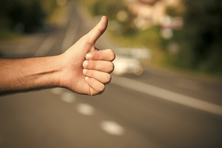 Travel, trip, vacation, wanderlust. Hitchhiking, hitching, thumbing, auto stop conceptの写真素材