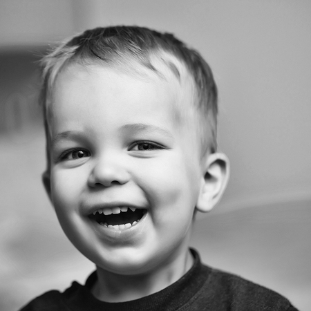 joyful child. Small laughing boy childの写真素材