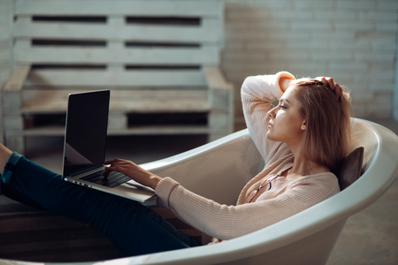 Agile business and communication. agile business of girl relax in bathroom.の写真素材