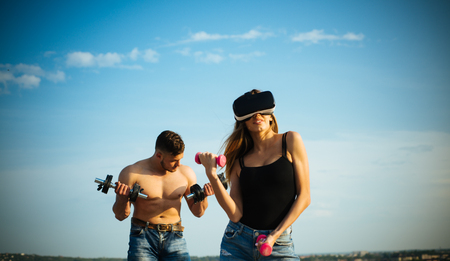 Innovation. Innovation for healthy life. Innovation is strong power. Woman use innovation for training on blue sky. Enjoy innovation technologiesの写真素材