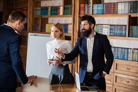 Digital concept. Group of students communicate on digital platform. Developing digital literacy skills with network devices and internet. Using digital media in learningの写真素材