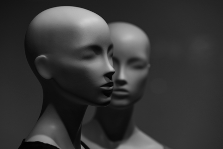 female dummy with no hair and makeup on shopping displayの写真素材