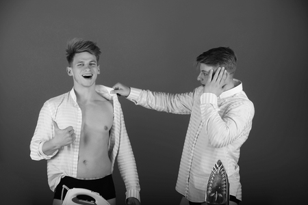 Men getting dressedの写真素材