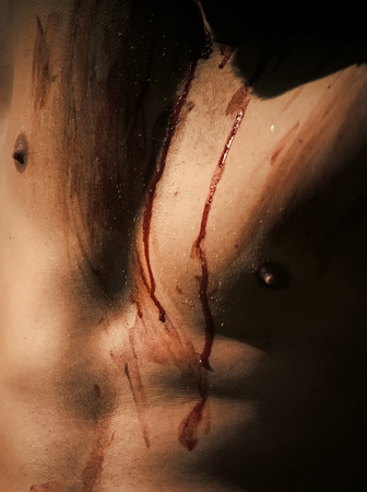halloween muscular chest of man zombie with blood