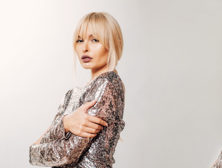 Beautiful autumn woman on fall nature background. Cheerful carefree woman in park on sunny autumn day. Autumnの写真素材