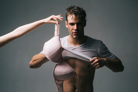 Male strippers and Private dancing for woman. Striptease is private dancing. Gender roles. Private dance inside the club.の写真素材