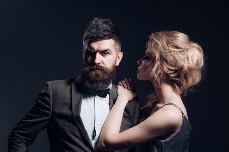 Love is the answer. Couple in love. Bearded man and sexy woman on first date. Couple of man and woman date on valentines day. Happy valentines day. Its our date nightの写真素材